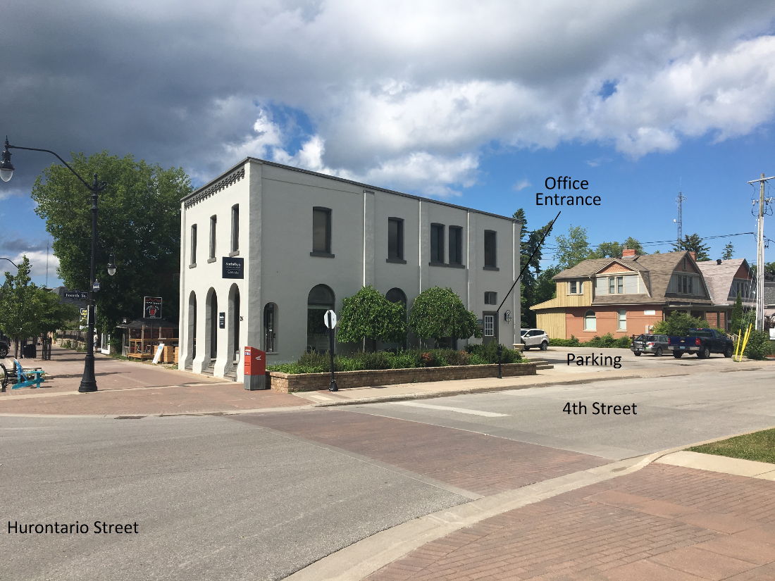 The office entrance is on 4th street and parking is around back.
